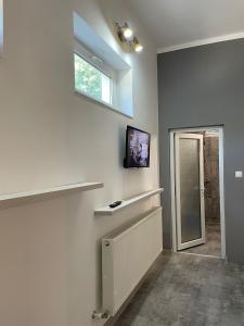 TV a/nebo společenská místnost v ubytování Casa Atlas + 33 fotografií