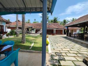 a view of the courtyard of a house at Breeze Backwater Homes in Cochin