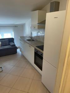 Kuchyň nebo kuchyňský kout v ubytování Apartments Christine