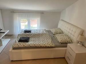 Postel nebo postele na pokoji v ubytování Apartments Christine