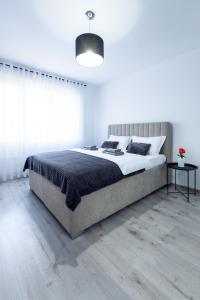 Säng eller sängar i ett rum på Apartmani Gala Foča