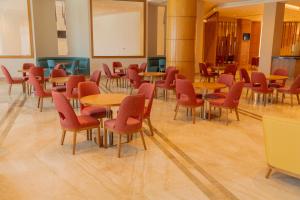 Tulip Inn Majan Hotel and Suites Salalah的休息区