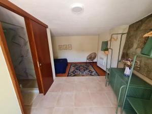 a hallway with a door and a room at Out of Town in Castelo de Paiva