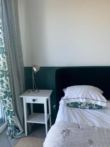 Postel nebo postele na pokoji v ubytování Botanica