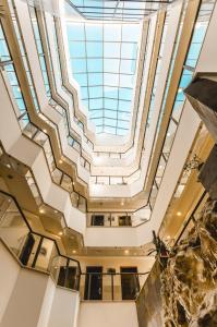 an image of a building with a skylight at Emily's Hotel in Tiberias