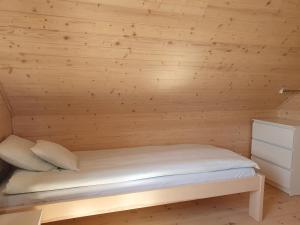 Postel nebo postele na pokoji v ubytování A&M Apartamenty