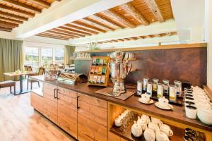 a kitchen with a counter with a blender on it at Landhotel Alte Mühle in Ostrach