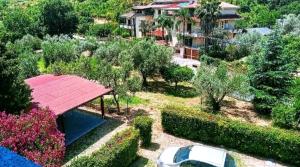an aerial view of a house with a swimming pool at Punto Verde B&B in Ardore Marina