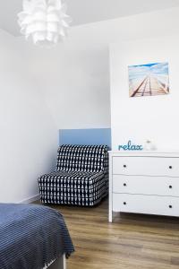 Postel nebo postele na pokoji v ubytování Domki Akacjowa