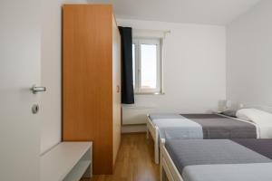 Postel nebo postele na pokoji v ubytování Apartment Sugar