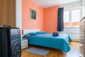 Postel nebo postele na pokoji v ubytování Apartment Sugar