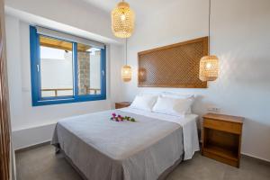 Ένα ή περισσότερα κρεβάτια σε δωμάτιο στο Venetia's apartments
