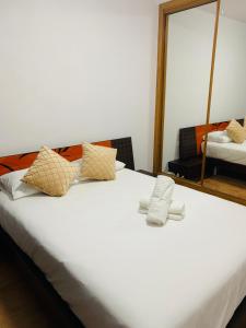 Postel nebo postele na pokoji v ubytování Lin House + 24 fotografií