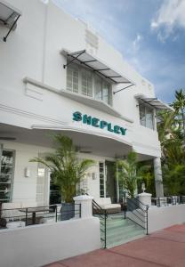 a building with a sign on the front of it at Shepley South Beach Hotel in Miami Beach