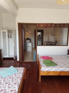 Postel nebo postele na pokoji v ubytování Alex Central City Accommodation