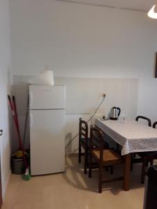 Kuchyň nebo kuchyňský kout v ubytování Alex Central City Accommodation