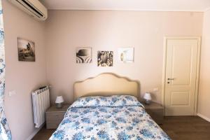 A bed or beds in a room at Terrazza La Delizia