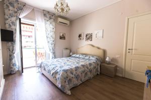 A bed or beds in a room at Terrazza La Delizia