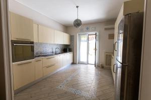 A kitchen or kitchenette at Terrazza La Delizia