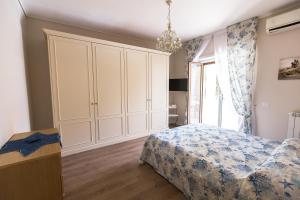 A bed or beds in a room at Terrazza La Delizia