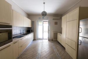 A kitchen or kitchenette at Terrazza La Delizia