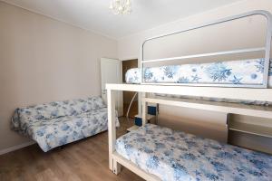 A bed or beds in a room at Terrazza La Delizia