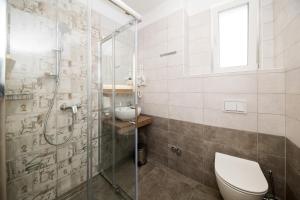 Koupelna v ubytování Villa Pellio Apartmani