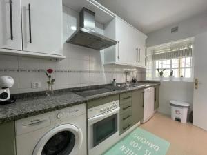 Kuchyňa alebo kuchynka v ubytovaní El Sabor del Sur, Apartamentos Living Sur