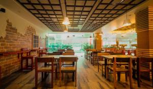 Restavracija oz. druge možnosti za prehrano v nastanitvi Hotel Yugantar & Banquets