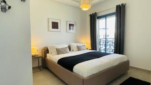 Voodi või voodid majutusasutuse Luxury Apartment with Pool toas