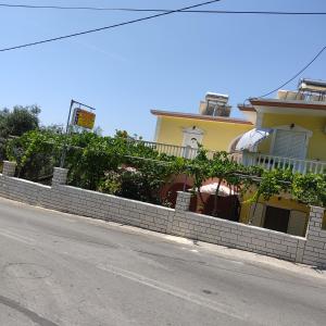 a retaining wall on the side of a street at Nikolaou Thomas House in Parga