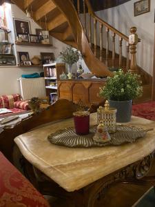 a wooden table with a tray on top of it at Aslibey Konaği - Adults Only in Sapanca