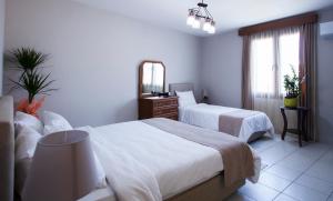 Кровать или кровати в номере Homelike Guest house