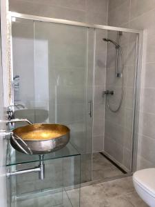a bathroom with a sink and a shower at Villa Marija in Vrsar +18 photos