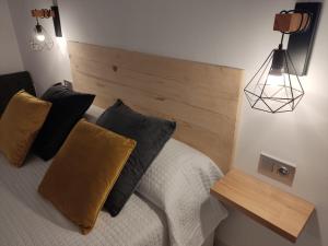 Posteľ alebo postele v izbe v ubytovaní NORDIC SUITE Apartamentos Minerva NEW APARTMENT Vistas al Mar