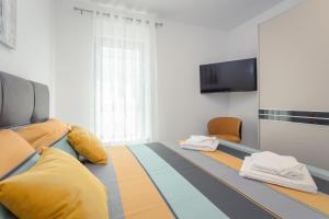 Postel nebo postele na pokoji v ubytování Luton + 36 fotografií