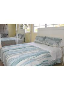 Postel nebo postele na pokoji v ubytování RELAX @ BAVARO BEACH, BIBIJAGUA