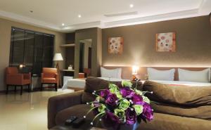 Posezení v ubytování Dela Chambre Hotel