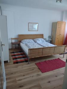 Łóżko lub łóżka w pokoju w obiekcie Apartment Trappelgasse