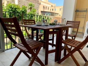 A balcony or terrace at VITTORIO EMANUELE HOUSE