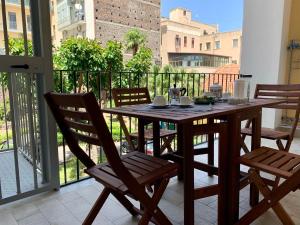 A balcony or terrace at VITTORIO EMANUELE HOUSE