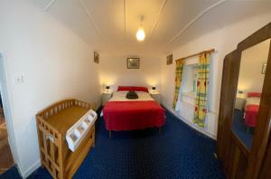 Posteľ alebo postele v izbe v ubytovaní Maisie's Seaside Cottage