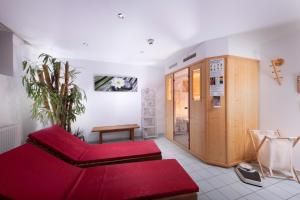 Łóżko lub łóżka w pokoju w obiekcie Familienhotel Central