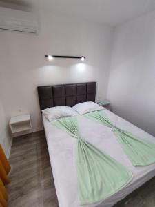 Postel nebo postele na pokoji v ubytování Horizont Dobre Vode