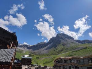 a view of a mountain from a city with buildings at CHALET CLUB VAL CLARET 1 46 in Tignes