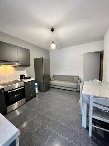 Kuchyň nebo kuchyňský kout v ubytování Atrium Apartment #2 + 4 fotografie