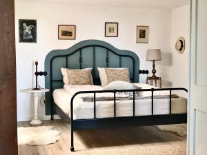 En eller flere senge i et værelse på Cheerful Cottage at Balatonfelvidek Dörgicse