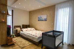Krevet ili kreveti u jedinici u okviru objekta Apartman Oblačak Divčibare