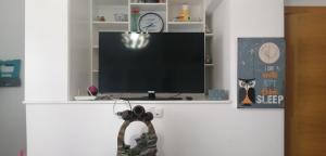 TV a/nebo společenská místnost v ubytování casapueblo