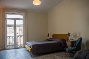 A bed or beds in a room at U'Panare